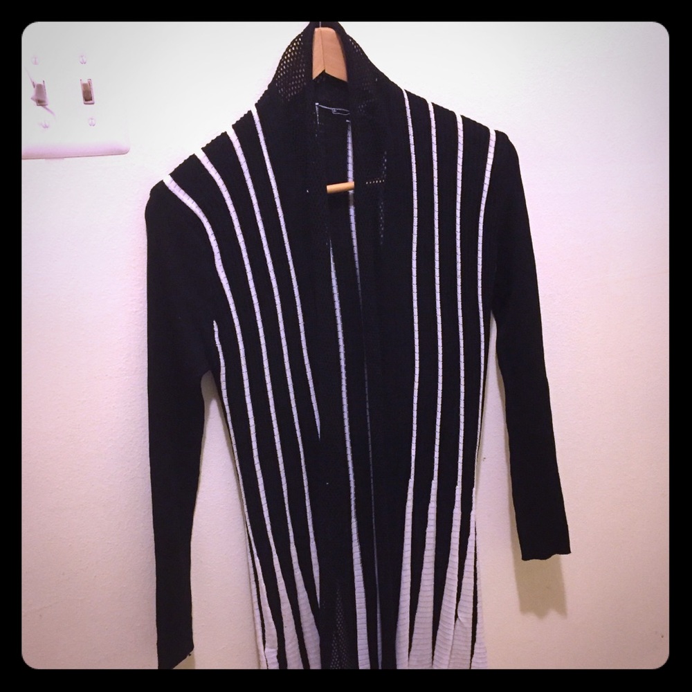 Black and white knitted sweater.